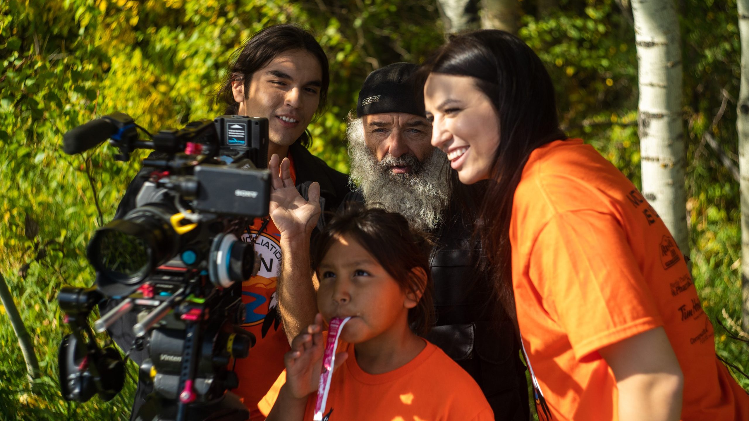 trechelle-bunn-cameraman-dave-gaudet-josh-and-child-check-footage-birtle-mb-by-thomas-charrett